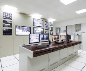 Ergotron HX Desk Dual Monitor Arm, Front View, White Colour, Two Monitors Mounted, Laboratory UsageUsage